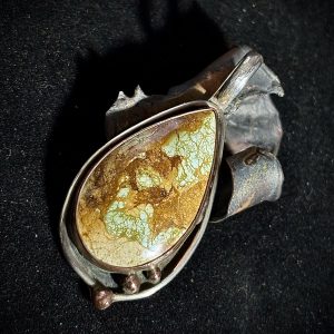 Hitachi Turquoise Pendant set in Sterling with Copper Accents