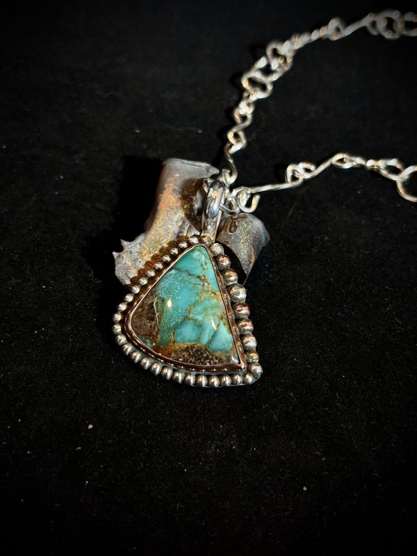 Kingman Turquoise Pendant set in Sterling with Copper Accents